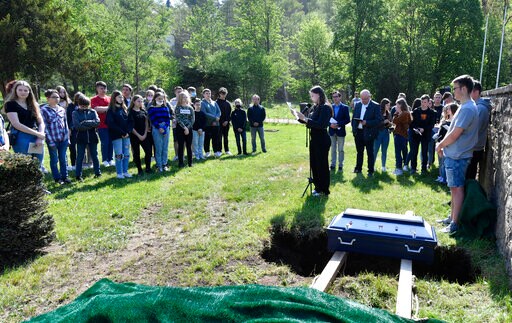 Peace at Last: German Students Bury Classroom Skeleton