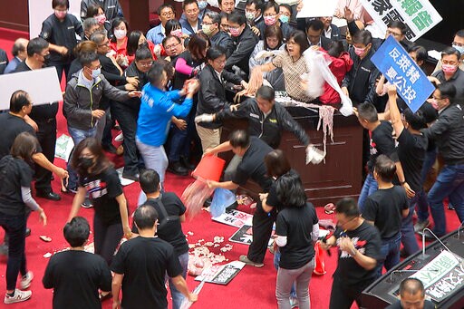 Lawmakers Throw Pig Guts, Punches on Taiwan Parliament Floor