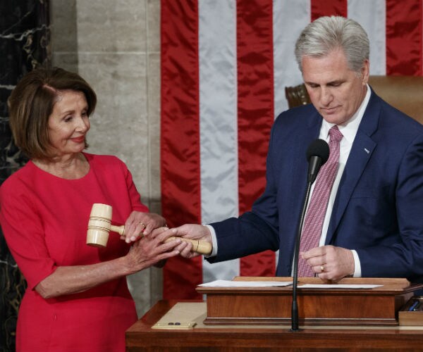 nancy pelosi takes the gavel from kevin mccarthy, Jan. 3, 2019 in washington, d.c. (Carolyn Kaster/AP)