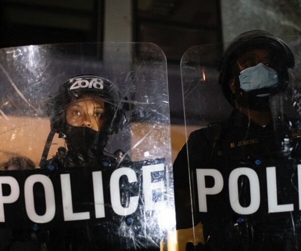 DC Rioters Throw Firecrackers at Police Station, Hurl Expletives