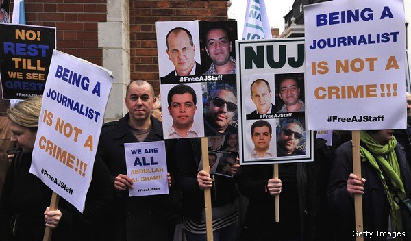 Egypt Puts Three Al Jazeera Journalists on Trial