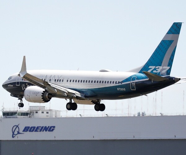 boeing 737 max jet lands