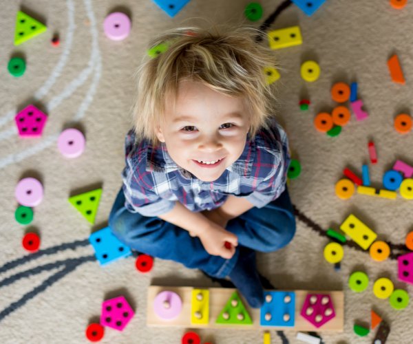 child playing with toys