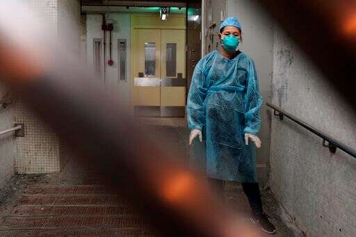 China's Daily Death Toll from Virus Tops 100 for First Time