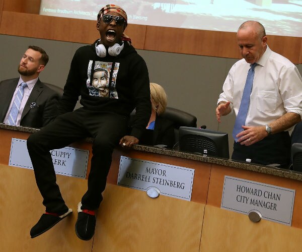 Shooting Victim's Brother Confronts Reporters