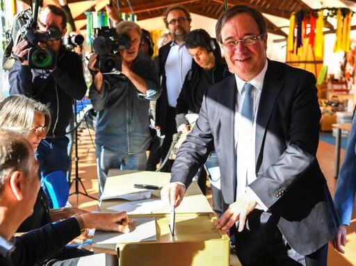 The Latest: Exit Polls: Merkel's Party Wins Key German State