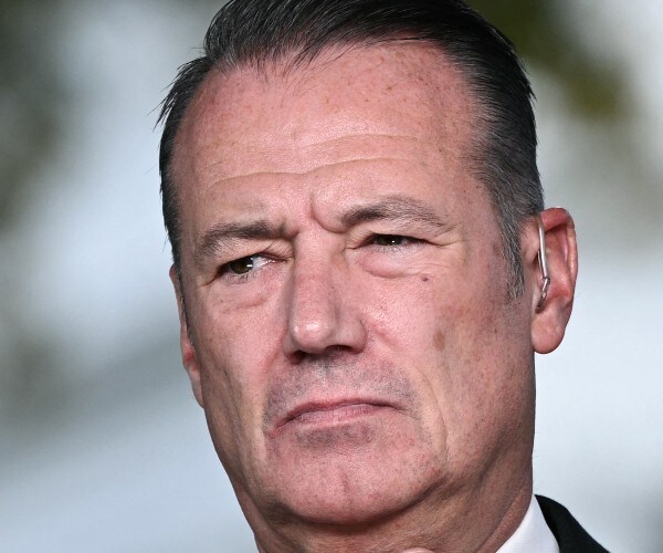 Two federal agents have been put on leave and are under investigation for allegedly lying about a sh...