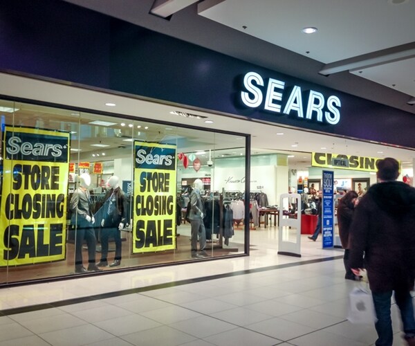 sears corporate logo symbol emblem on store front