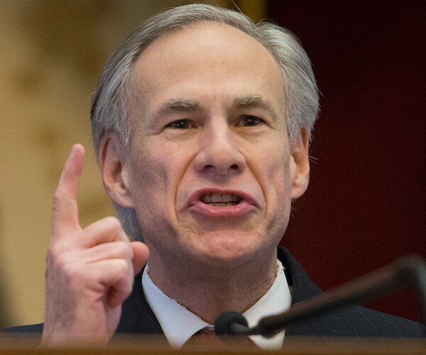greg abbott speaks to a congressional hearing