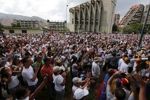 The Latest: Venezuelan Protesters cross into Western Caracas