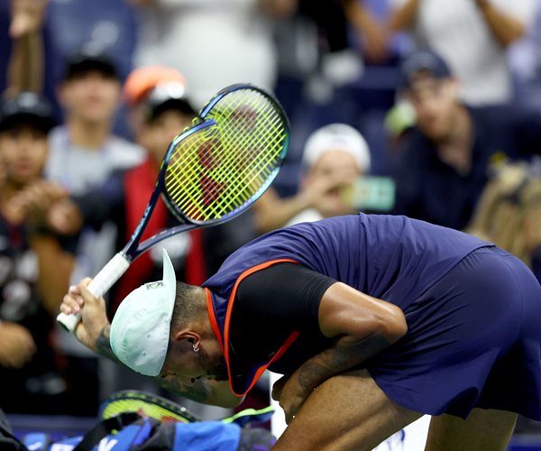 Nick Kyrgios smashes his racket 