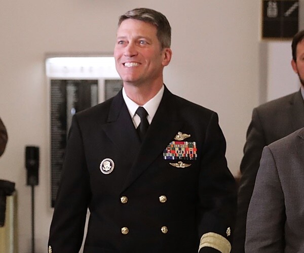 dr. ronny jackson arrives at the senate veterans affairs committee
