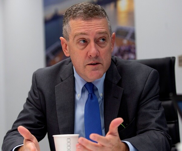 james bullard sits at table