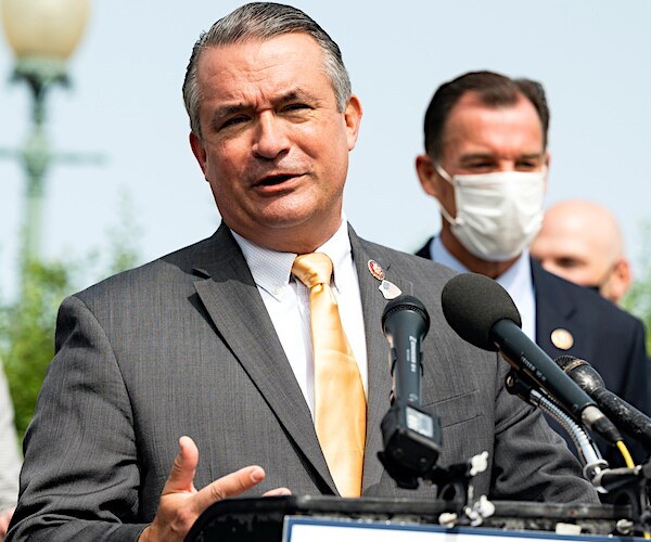 don bacon speaks during a campaign rally