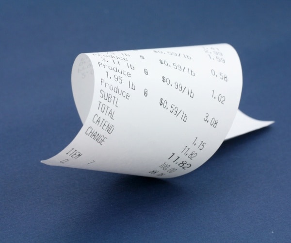 a curleld-up paper receipt