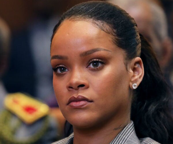 Rihanna Urges Fans to Delete Snapchat after Ad Mocking Assault by Brown