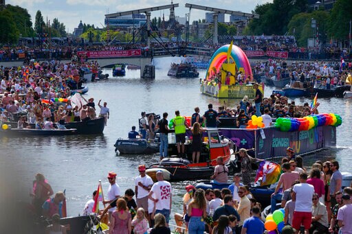 Huge Crowds Watch Amsterdam Pride's Canal Parade Celebration