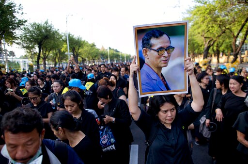 The Latest: Urn Symbolizing King's Remains Placed in Shrine