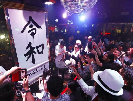 The Latest: Emperor Naruhito Inherits Imperial Regalia