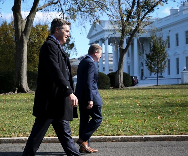 jim acosta walks back into white house with restored credentials