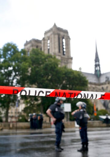 The Latest: Notre Dame Assailant Cried 'It's for Syria'