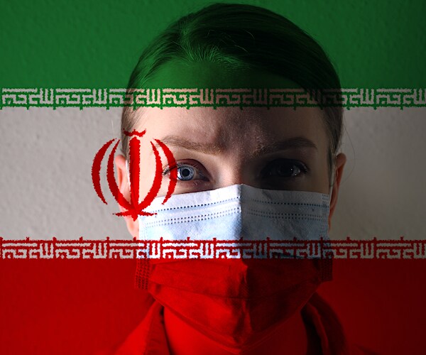 Girl in a mask against the background of the Iran flag. Coronavirus, danger of disease, new virus
