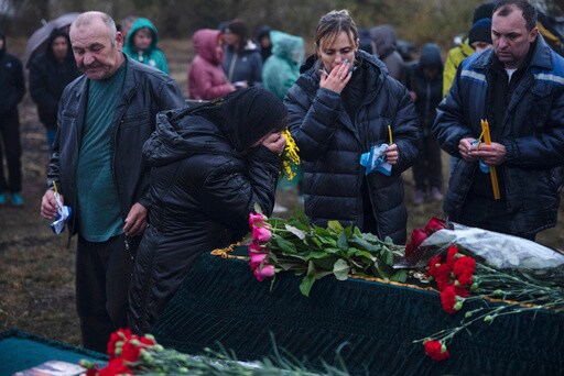 Days after Deadly Missile Strike on Ukrainian Cafe, Grief and a Search for Answers