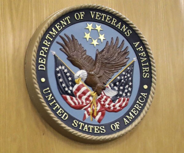 The Veterans Affairs logo hanging on a wall