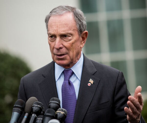 Former New York Mayor Mike Bloomberg answers questions at a press conference