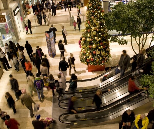 a mall with holiday decorations at Christmas time