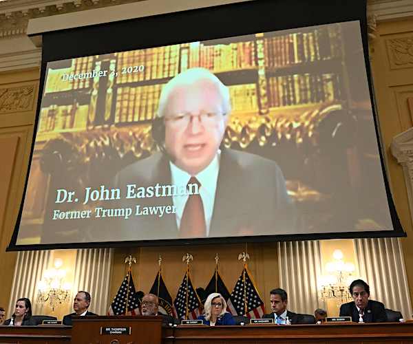 john eastman speaks virtually on a video screen above the house jan. 6 select committee