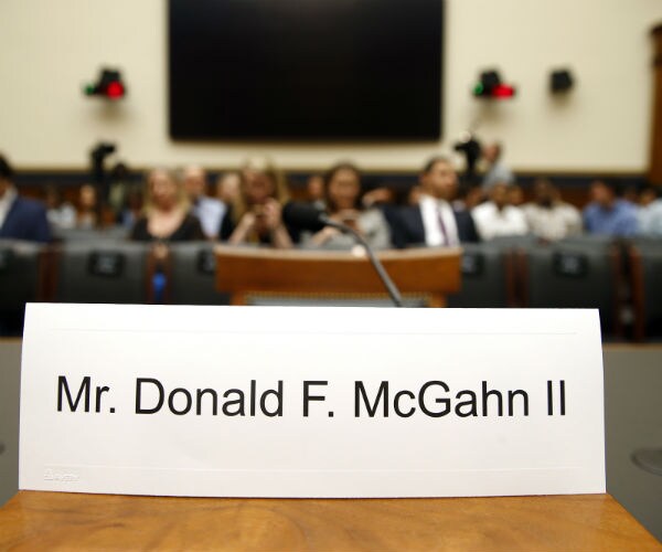 a placard is shown for former white house lawyer don mcgahn