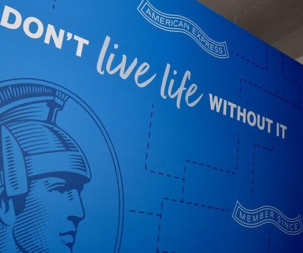 AmEx Profits Fall 9% as Customers Fall Behind on Payments