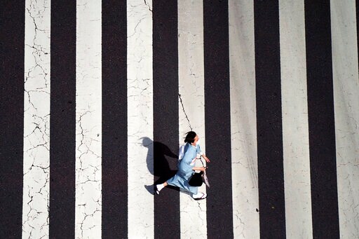 Japan to Fully Lift COVID-19 Restrictions as Infections Slow