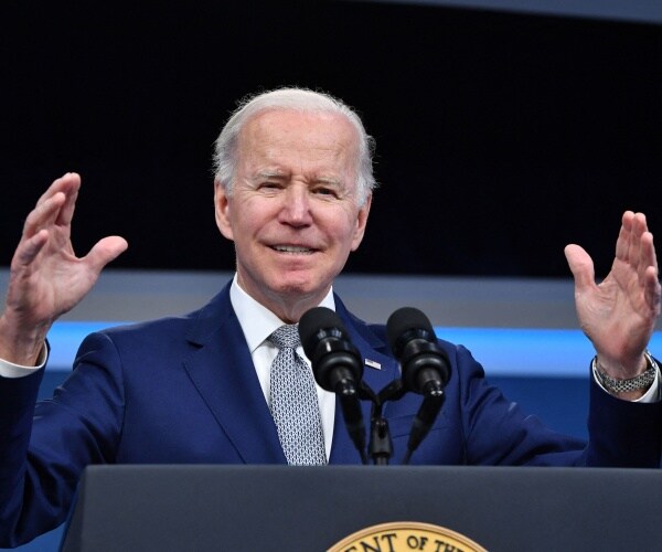 joe biden gestures while speaking