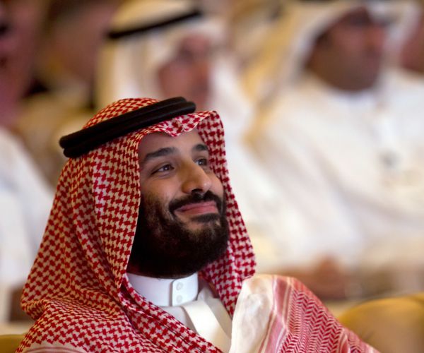 saudi crown prince mohammed bin salman smiles as he attends a conference in saudi arabia. 