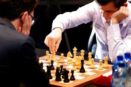 Norway's Carlsen Beats Caruana to Defend Chess World Title