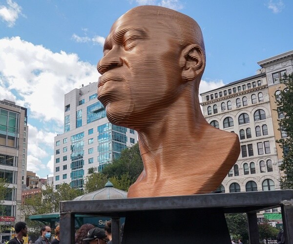 large george floyd bust in art exhibit in park