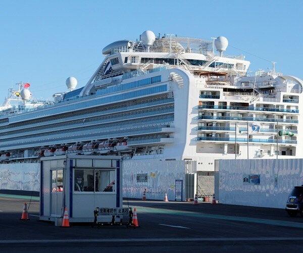 the diamond princess cruise ships sits a a berth in hokkaido
