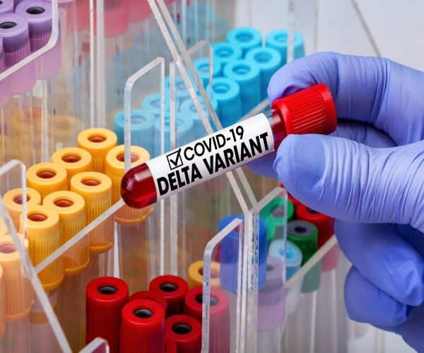 vial of blood labeled "Delta variant"