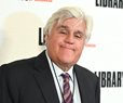 Jay Leno Hangs Out of Plane in Daring Mid-Air Stunt