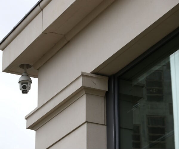 A CCTV camera in Pancras Square near Kings Cross Station in London, England.