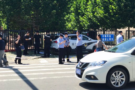 The Latest: Police Say Man Injured Setting off Embassy Blast