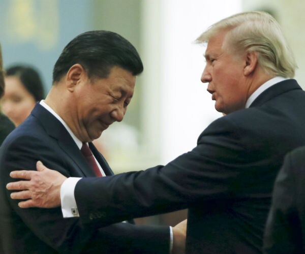President Donald Trump speaks to Chinese President Xi Jinping