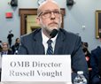 Russell Vought listening at hearing