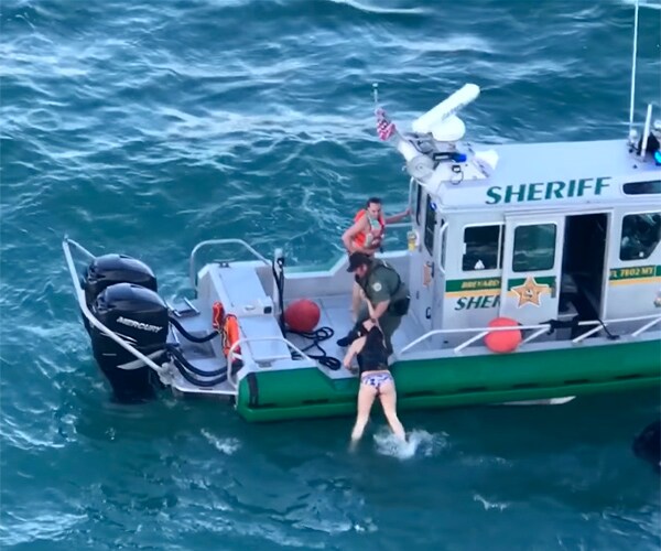 Cruise Ship Nearly Runs Over Jet Skiers in Port Canaveral (Video)