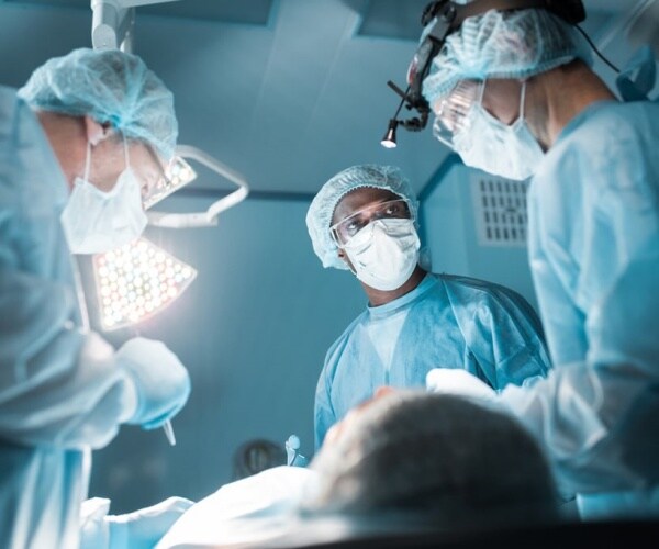 surgeons in operating room