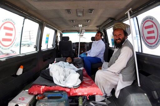 Officials: Afghan Forces Push Back Taliban from Key City