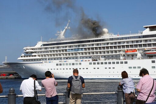 Black Smoke Billowing from Cruise Ship Docked near Tokyo