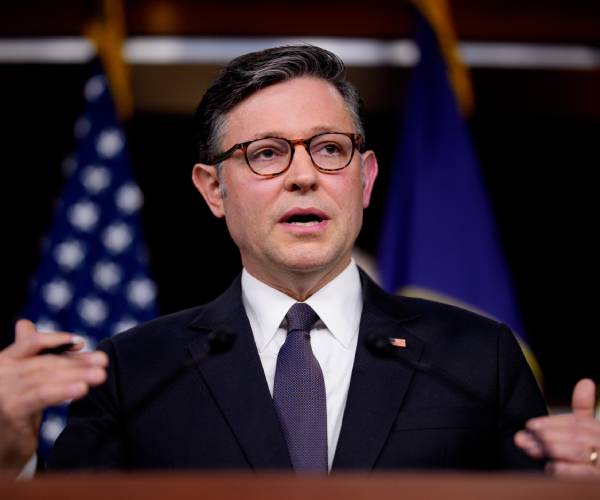 House Speaker Mike Johnson, R-La., says he's "open to the conversation" about banning stock trades b...